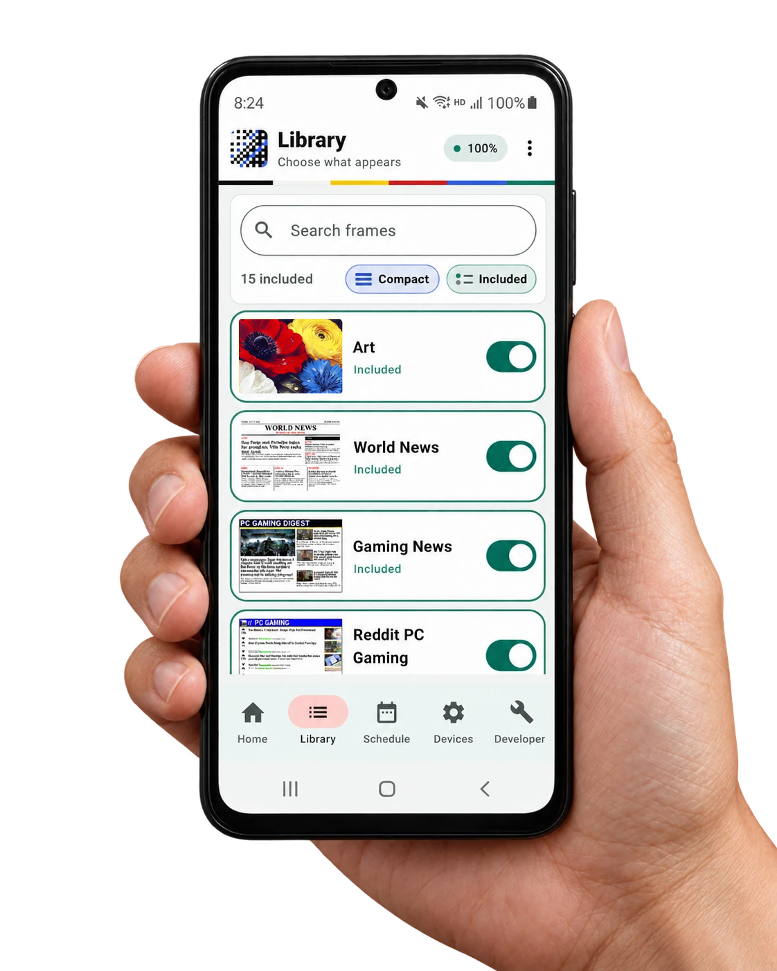 Hand holding a phone showing the companion app Library tab in Compact view